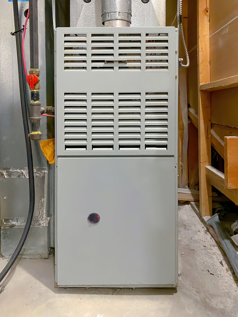 Gas furnace installed in a home's basement.